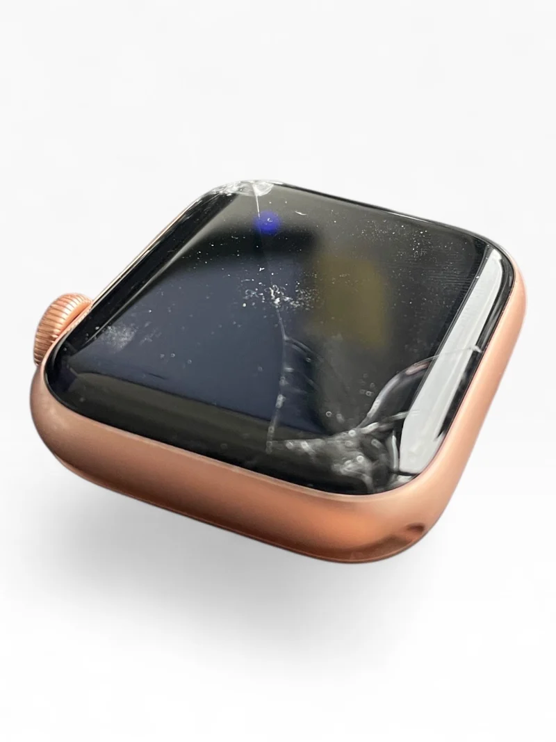Apple Watch SE GPS 40mm mit Gold Aluminiumgehäuse & Sportarmband in Starlight.
