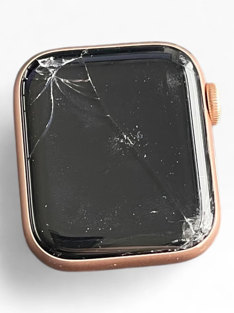 Apple Watch SE GPS 40mm mit Gold Aluminiumgehäuse & Sportarmband in Starlight.