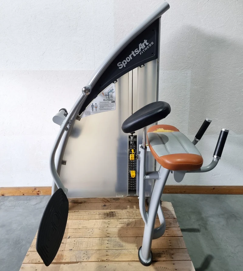 SportsArt Gluteus Maschine S955 A955 N955 Pomaschine stehend, Glutes Kick Radial, Rahmenfarbe Silber, Polsterfarbe Orange/Grau, gebraucht - überholter Zustand