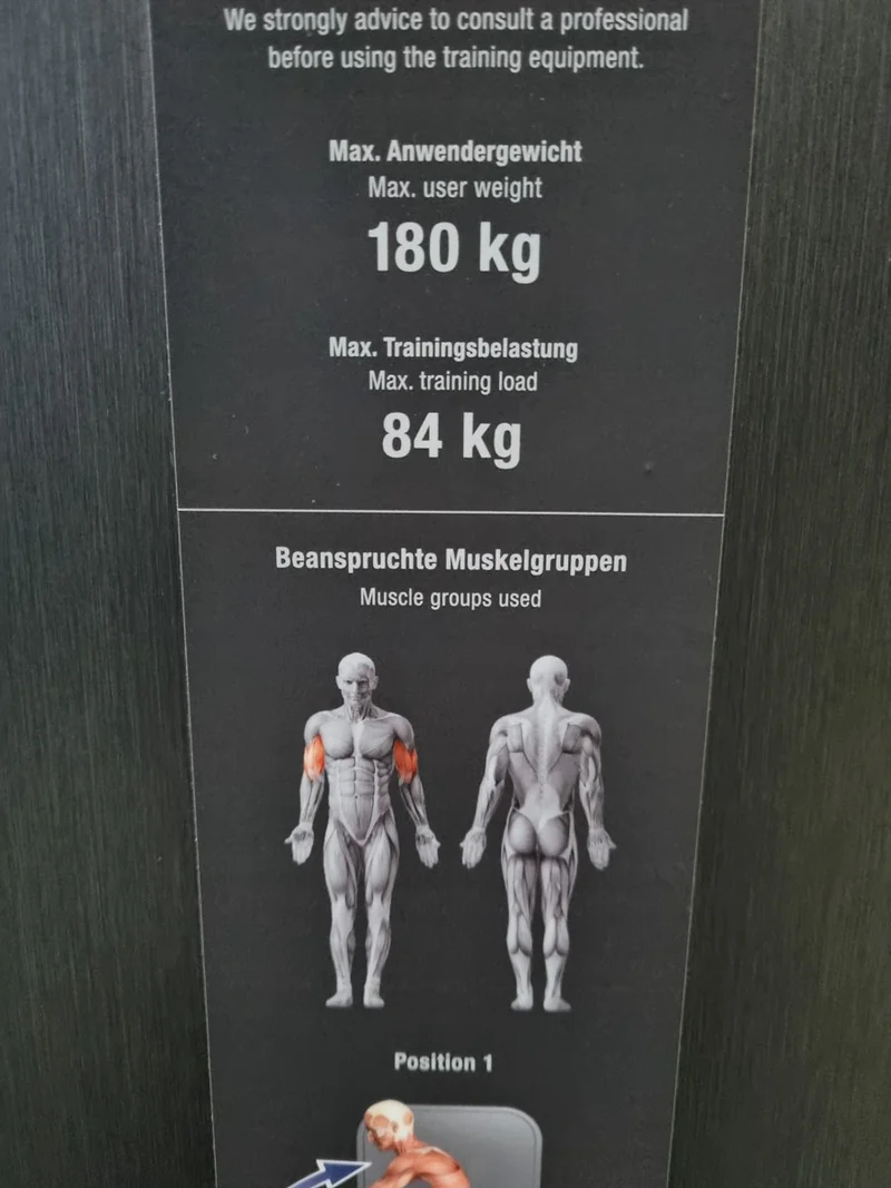 Milon Milcanic Bizepsmaschine, Biceps Arm Curl Machine, Armbeuger, drehbare Griffe, Rahmen Silber, gebraucht - Ausstellungsstück - Top Zustand