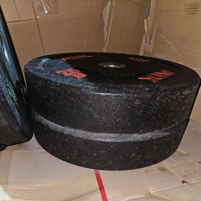 Set 230kg Bumper Plates von ATX - 2x 25kg, 4x 20kg, 4x 15kg, 4x 10kg, Hantelscheiben 50mm Durchmesser aus Granulat gepresst in Schwarz mit bunten Farbflecken, gebraucht - mit Gebrauchsspuren